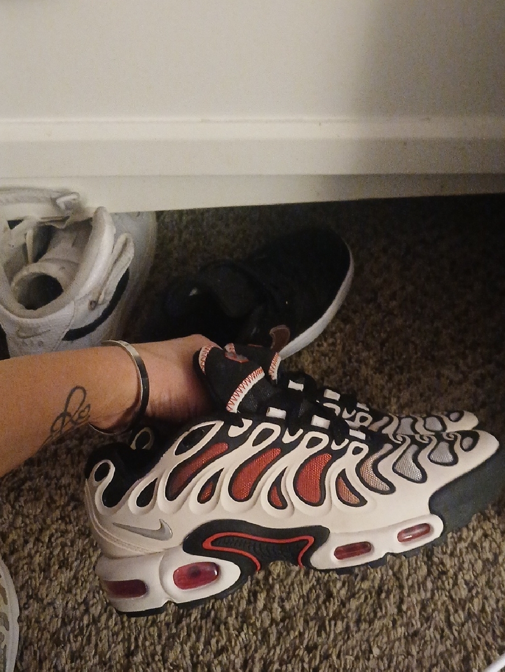 Nike Women's TN-style White Black and Red Accent Sneakers